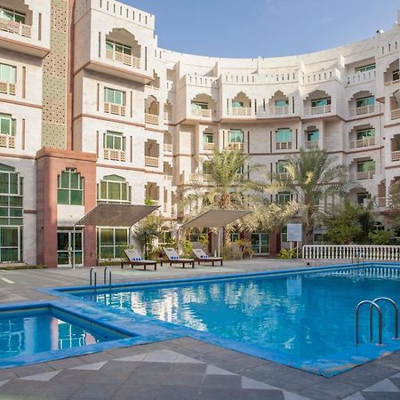 Muscat Oasis Residences Bagian luar foto