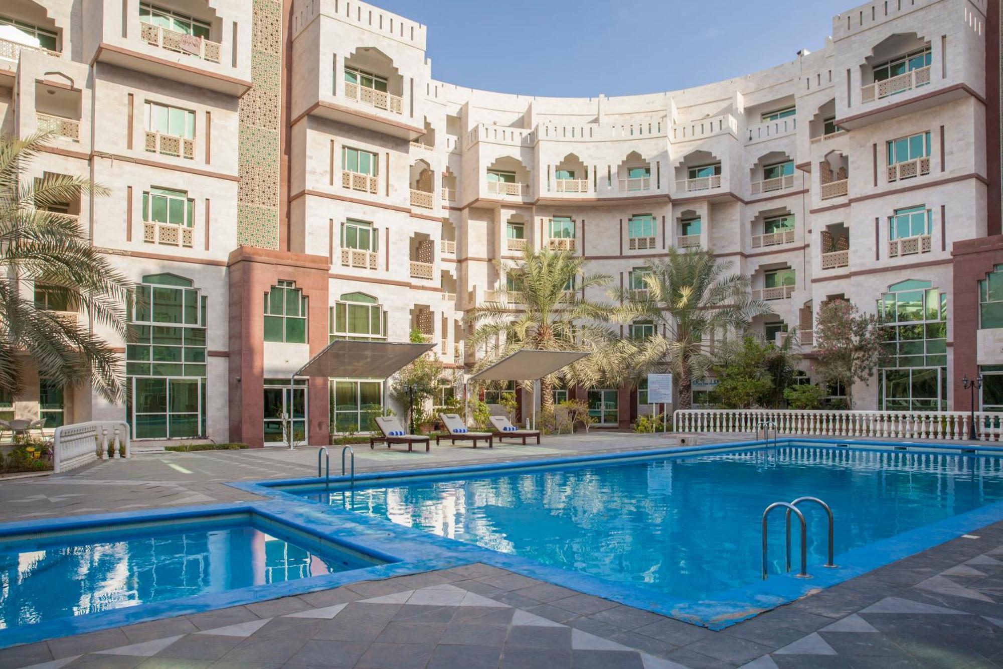Muscat Oasis Residences Bagian luar foto