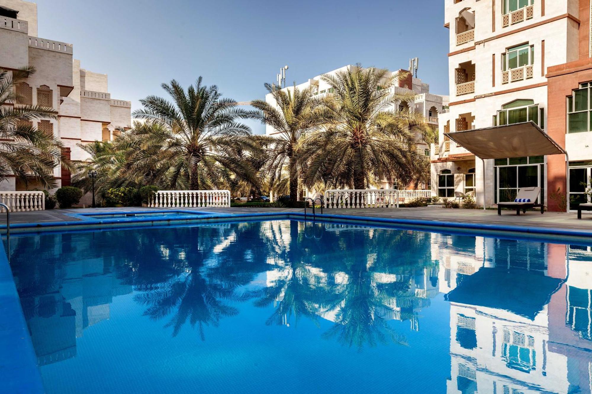 Muscat Oasis Residences Bagian luar foto