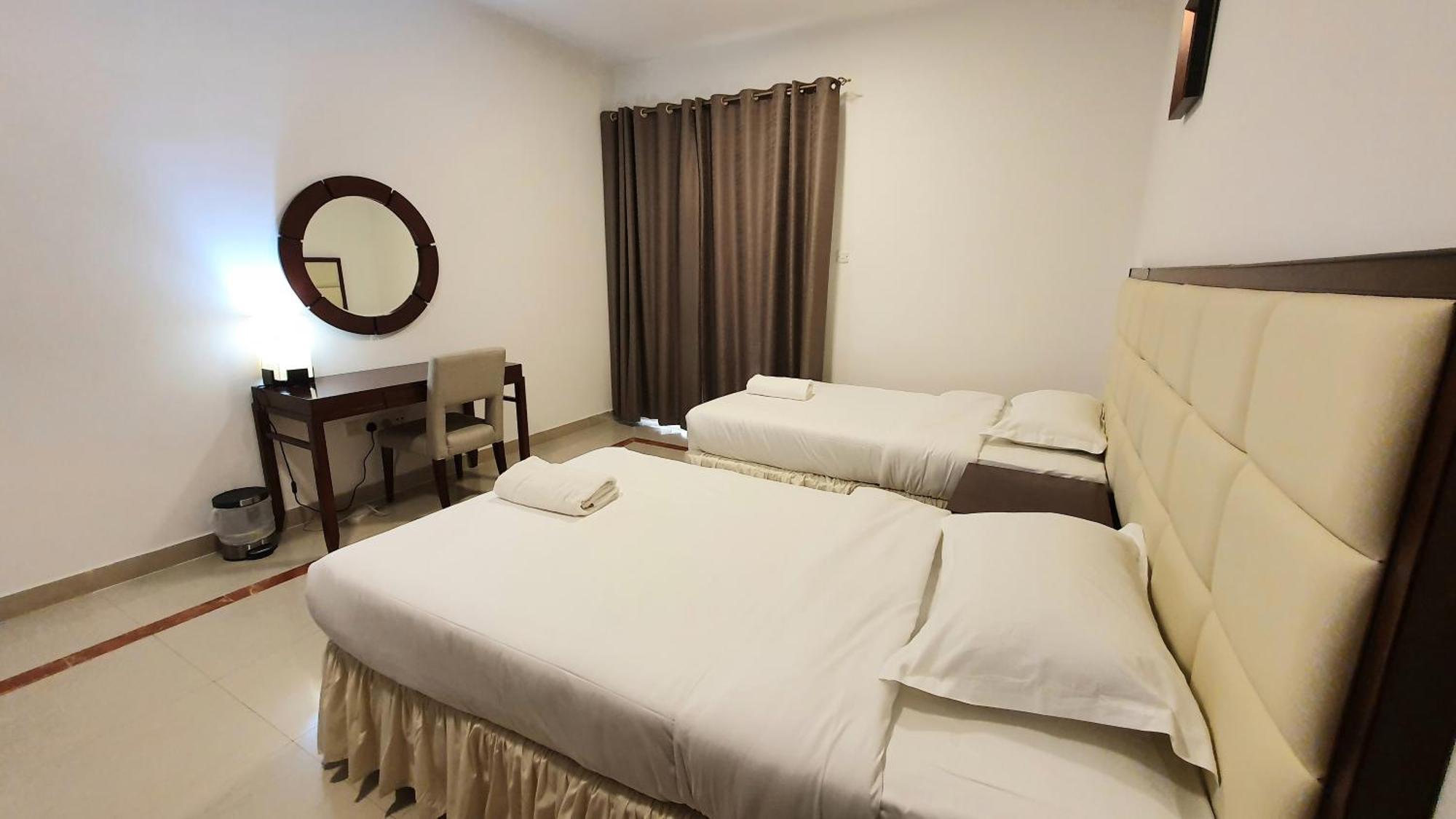Muscat Oasis Residences Bagian luar foto