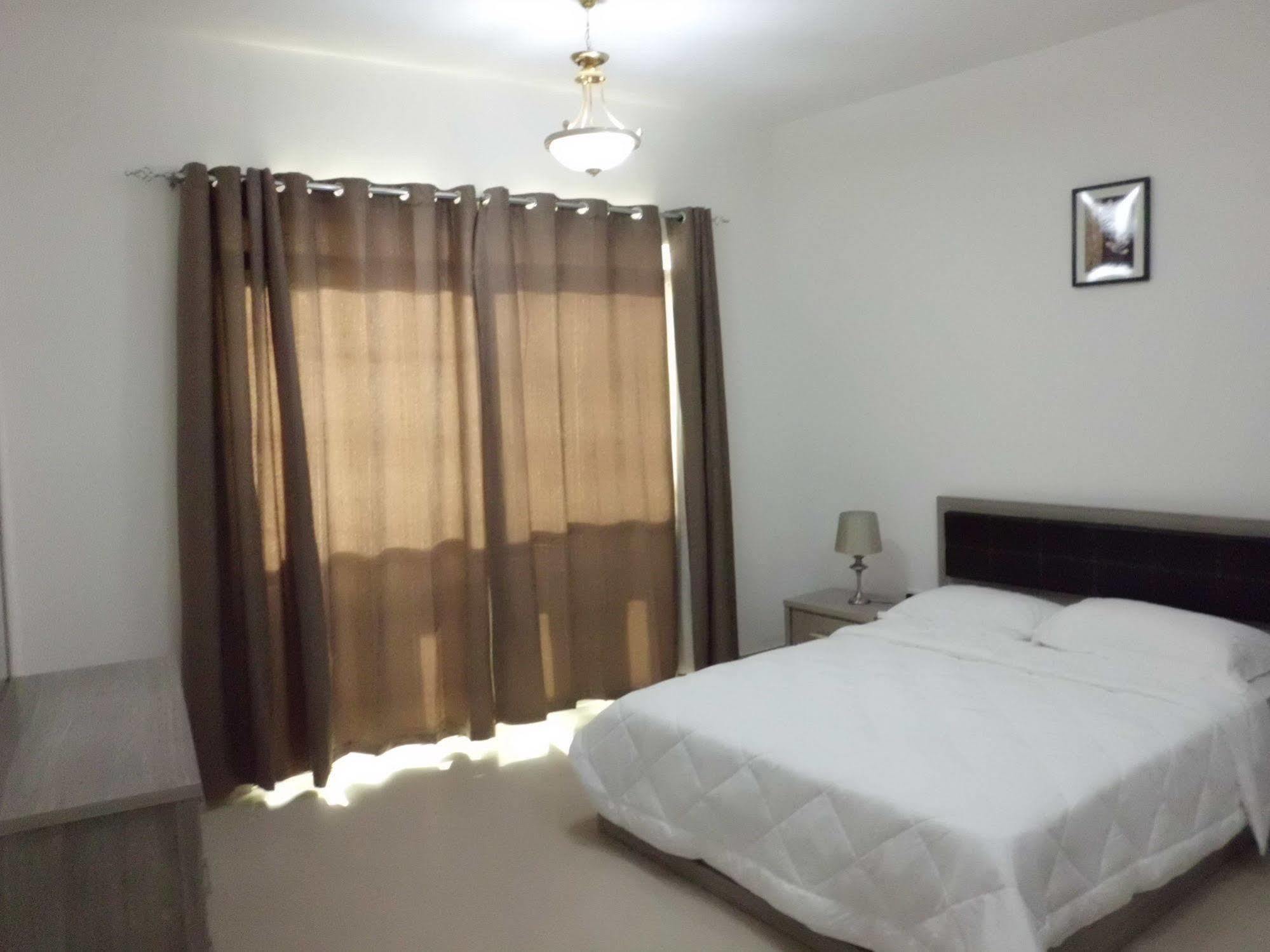Muscat Oasis Residences Bagian luar foto